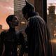 Batman grabbing Catwoman